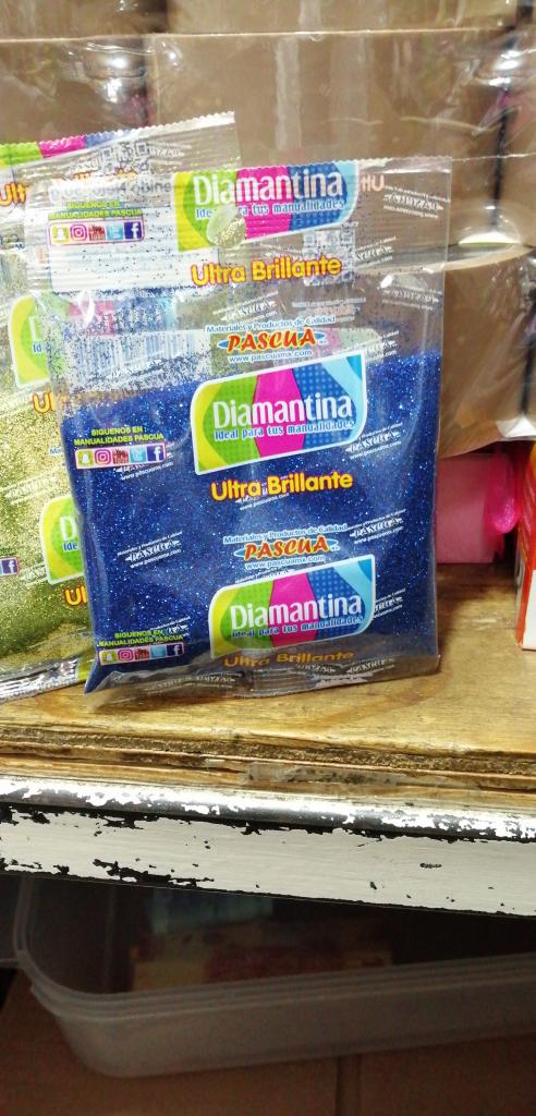 BOLSA CON DIAMANTINA DE 50 GRAMOS CADA BOLSA.
